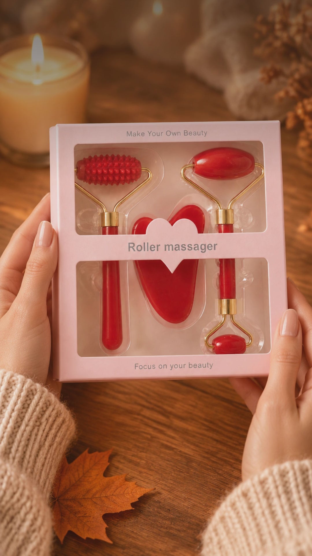 Sérénité Gua Sha & Roller Set in Rood, Roze en Wit, in een warme herfstsfeer